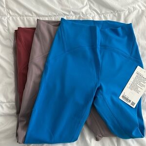 THREE pairs of Instill High Rise Leggings